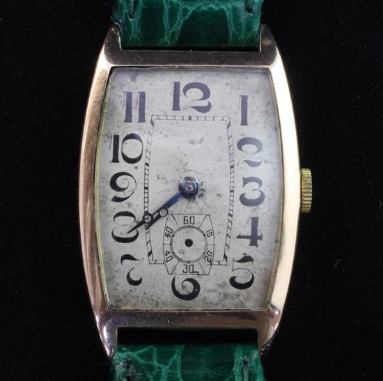 A gentlemans stylish 1920s Swiss 9ct gold manual wind wrist watch,